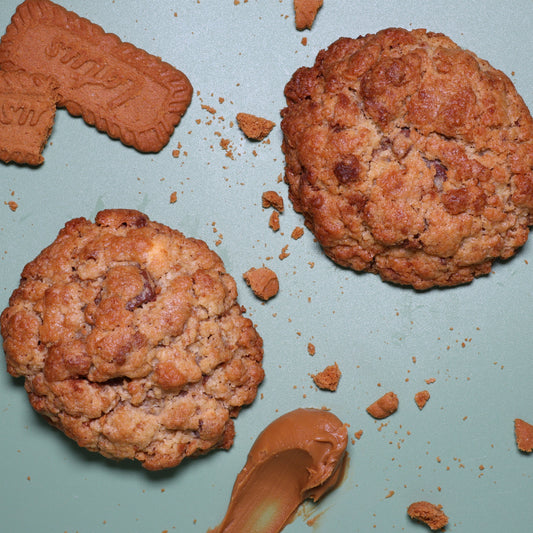 Cookies and cookie pieces on a blue background